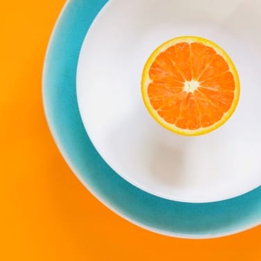 cut orange on a plate